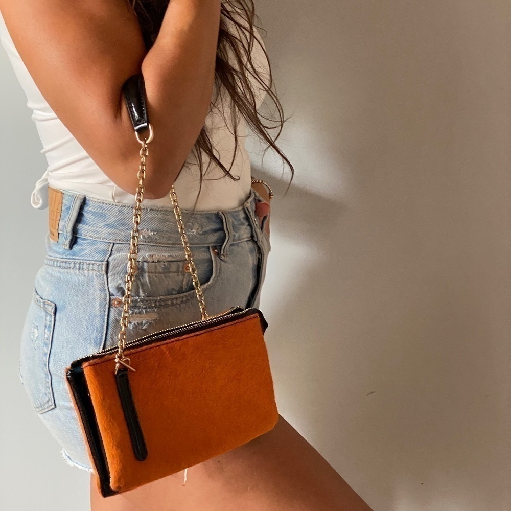 Sondra  ROBERTS  orange wallet on chain